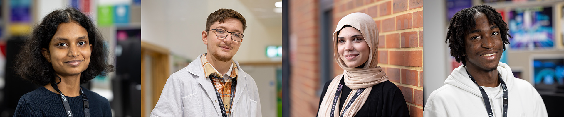 Four Harrow College students. A girl with shoulder length hair wearing a blue top and black lanyard, a boy in a lab coat and wearing glasses, a girl standing against a brick wall, a boy wearing a white hoodie and black lanyard.