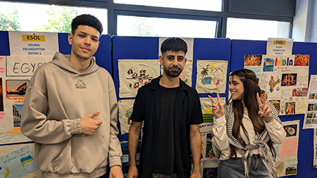 Harrow students standing in front of thier cultural displays at the Fusion Fiesta - Cultural Day